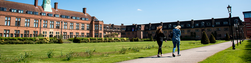 students walk across rectorate lawn at Hope